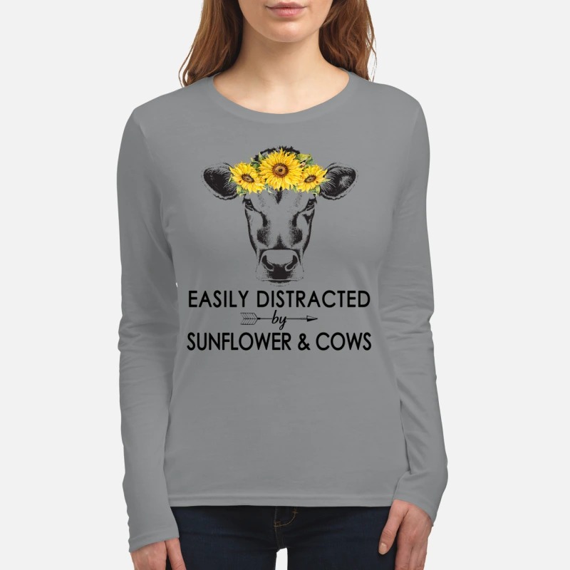Easily distracted by sunflower and cows women's long sleeved shirt
