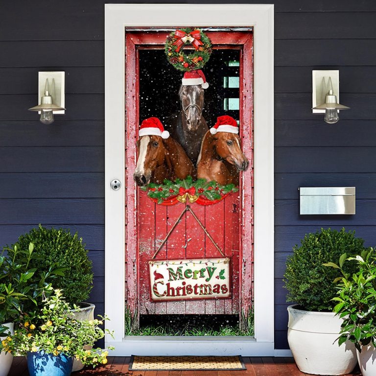 Three horses in the barin merry christmas door cover