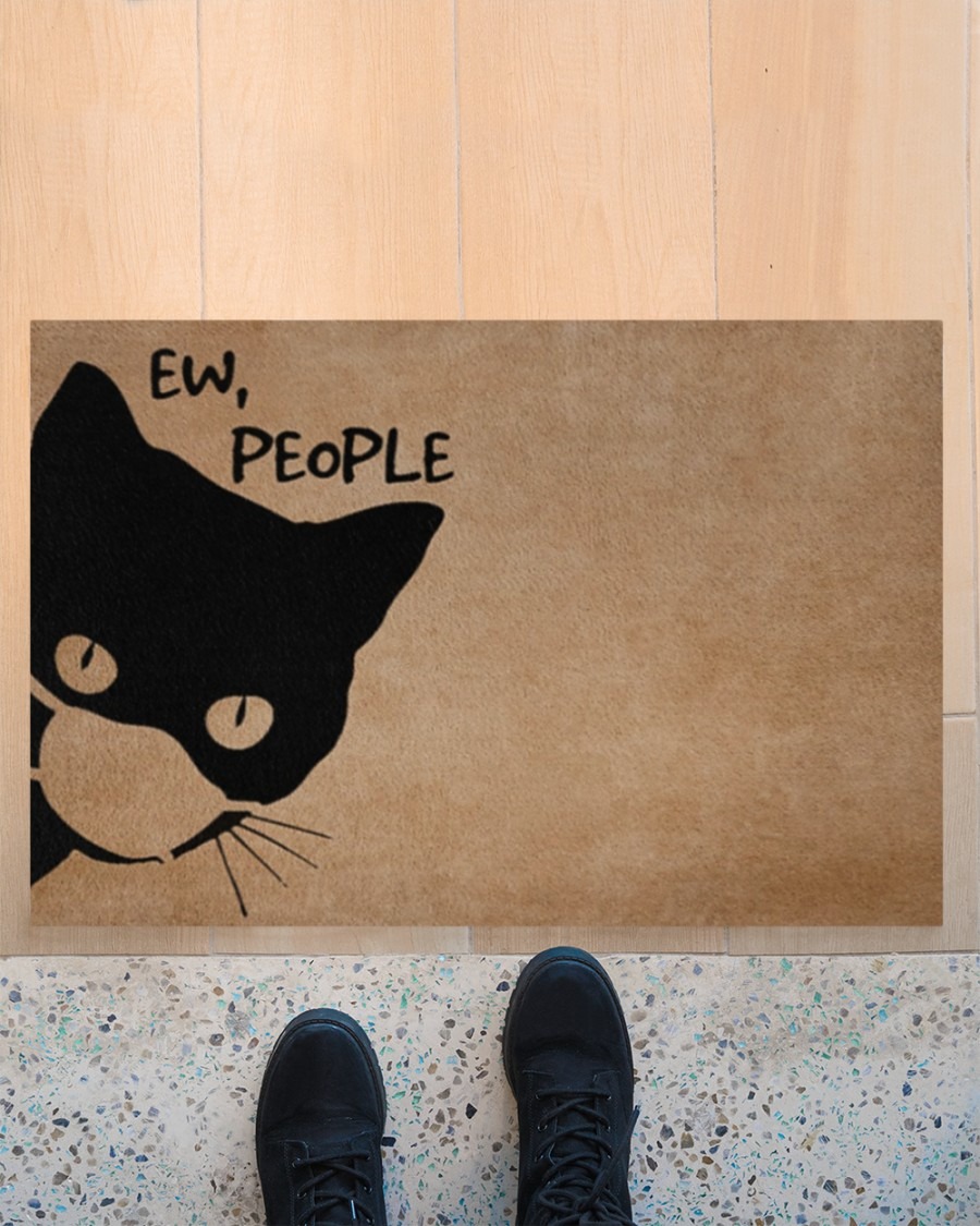 Cat ew people doormat